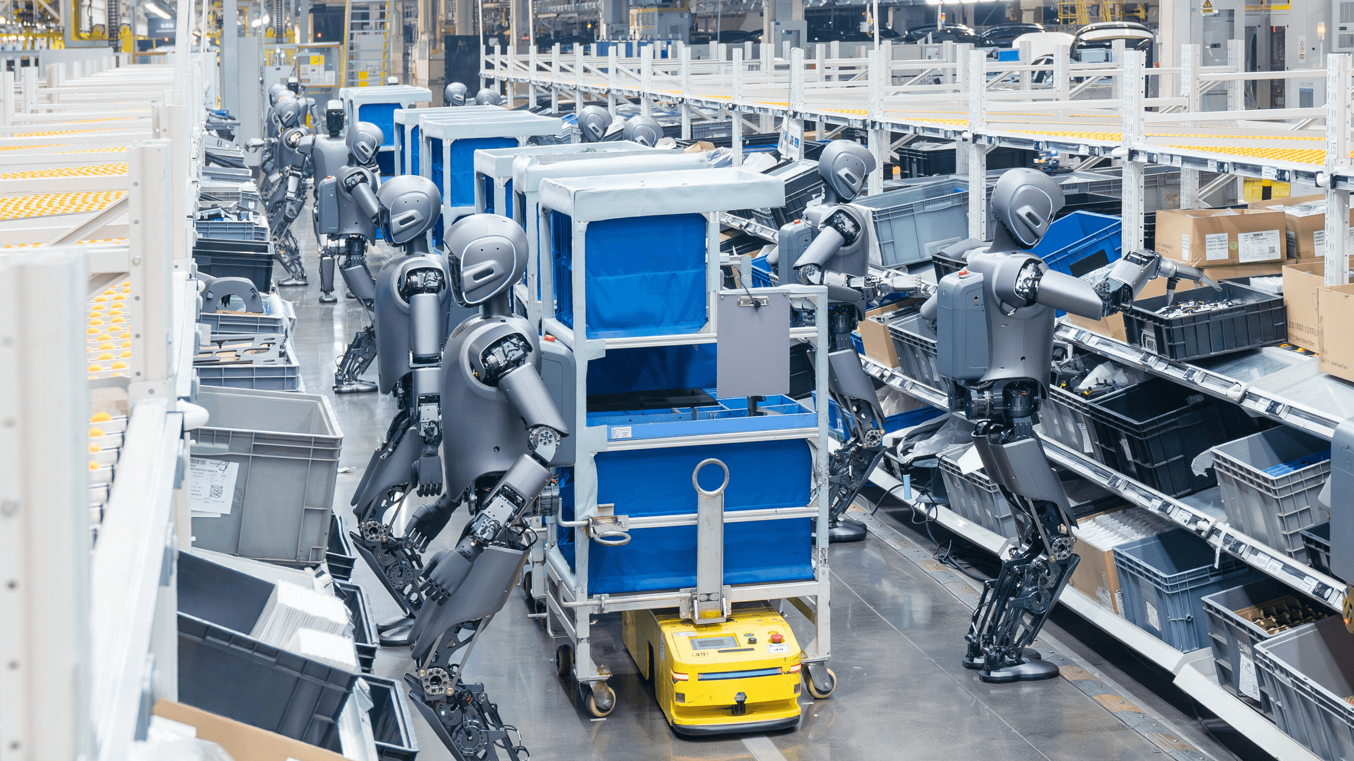 Humanoid robots moving through an assembly line